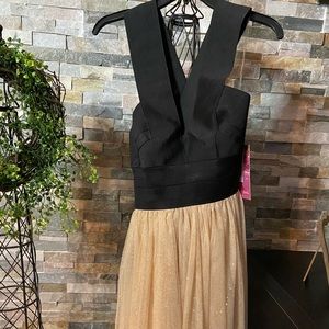 Beautiful asymmetrical dress.